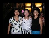 Near the end of the cruise some of the Philippino staff put on a national folklore show. Afterward Shu-Fong and Angie pose with Sheilo, one of our favorite waitress.